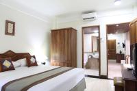 The Jayakarta Bali Beach Resort客房内的一张或多张床位