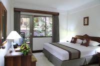 The Jayakarta Bali Beach Resort客房内的一张或多张床位