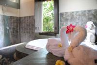 The Jayakarta Bali Beach Resort客房内的一张或多张床位