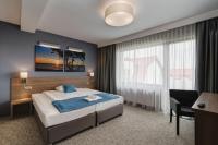 WIND Hotel客房内的一张或多张床位