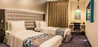 Fairway Colombo - Sri Lanka&#39;s First Hotel With Robot Technology客房内的一张或多张床位