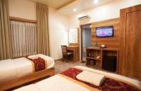 Jungle Safari Lodge- Serenity in the Wild客房内的一张或多张床位