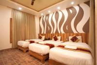 Jungle Safari Lodge- Serenity in the Wild客房内的一张或多张床位