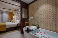 Allegro Hoi An . A Little Luxury Hotel & Spa客房内的一张或多张床位