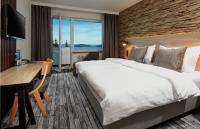 OREA Resort Horizont Šumava客房内的一张或多张床位