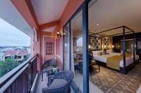 Allegro Hoi An . A Little Luxury Hotel & Spa客房内的一张或多张床位