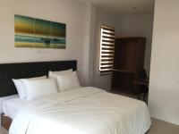 The Lodge at Koh Kood客房内的一张或多张床位