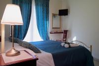 B&amp;B MareAgrò客房内的一张或多张床位