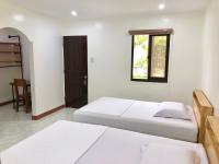 Casa de Moalboal客房内的一张或多张床位