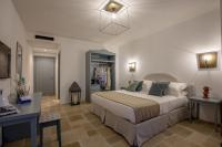 Romantic Relais Sorrento客房内的一张或多张床位
