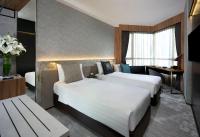 The Harbourview - Chinese YMCA of Hong Kong客房内的一张或多张床位