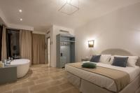 Romantic Relais Sorrento客房内的一张或多张床位
