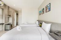 Evergreen Suite Hotel客房内的一张或多张床位