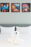 Evergreen Suite Hotel客房内的一张或多张床位