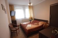 Hotel Restauracja Kaukaska Jadwiga Choroszy客房内的一张或多张床位