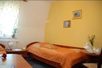 Hotel Restauracja Kaukaska Jadwiga Choroszy客房内的一张或多张床位