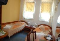 Hotel Restauracja Kaukaska Jadwiga Choroszy客房内的一张或多张床位