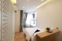 The LOL Elephant Hostel客房内的一张或多张床位