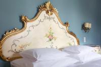 Das REGINA Boutiquehotel客房内的一张或多张床位