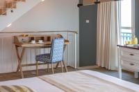 Herods Boutique Eilat a Premium collection by Fattal Hotels客房内的一张或多张床位