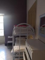 Sunshine Hostel Palermo客房内的一张或多张床位