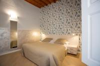 Hotel Bencidormi客房内的一张或多张床位