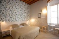 Hotel Bencidormi客房内的一张或多张床位