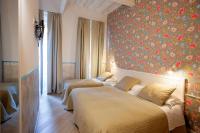 Hotel Bencidormi客房内的一张或多张床位