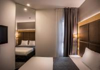 Hotel Astral Nirvana Club- Half Board客房内的一张或多张床位