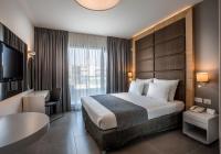 Hotel Astral Nirvana Club- Half Board客房内的一张或多张床位