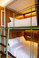 Khunluang Hostel客房内的一张或多张床位