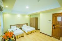 Golden Gate China Town Hotel客房内的一张或多张床位