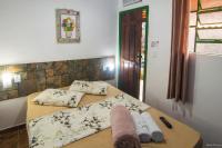 Pousada Casa do Rio Hostel - 8 min do Centro Hístorico - Passeio de Barco com saída da Pousada -Pago a parte- Perto das Praias e Beira Rio客房内的一张或多张床位