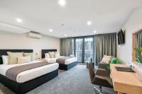 Southwark Hotel & Apartments客房内的一张或多张床位