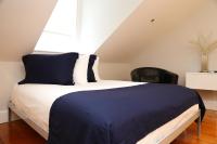 Charming & Stylish Studio on Beacon Hill #15客房内的一张或多张床位