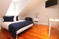 Charming & Stylish Studio on Beacon Hill #15客房内的一张或多张床位