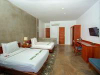 Tanei Angkor Resort and Spa客房内的一张或多张床位
