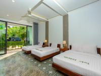 Tanei Angkor Resort and Spa客房内的一张或多张床位