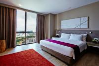 Qliq Damansara Hotel客房内的一张或多张床位
