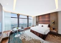 Oasis Aurum 181 Hotel客房内的一张或多张床位