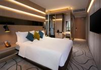 The Harbourview - Chinese YMCA of Hong Kong客房内的一张或多张床位