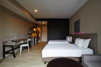 Qliq Damansara Hotel客房内的一张或多张床位