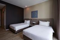 Qliq Damansara Hotel客房内的一张或多张床位