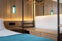 Lignum Suites Chania客房内的一张或多张床位