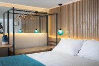 Lignum Suites Chania客房内的一张或多张床位