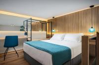 Lignum Suites Chania客房内的一张或多张床位