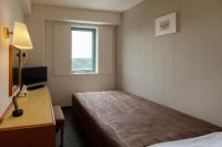 Center Hotel Narita1客房内的一张或多张床位