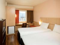 ibis Recife Boa Viagem客房内的一张或多张床位
