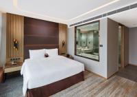 Oasis Aurum 181 Hotel客房内的一张或多张床位