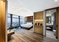 Oasis Aurum 181 Hotel客房内的一张或多张床位
